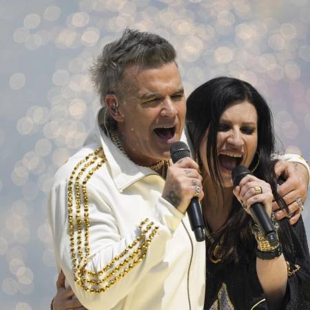 Laura Pausini y Robbie Williams conquistaron la final de la FIFA con “Desire”